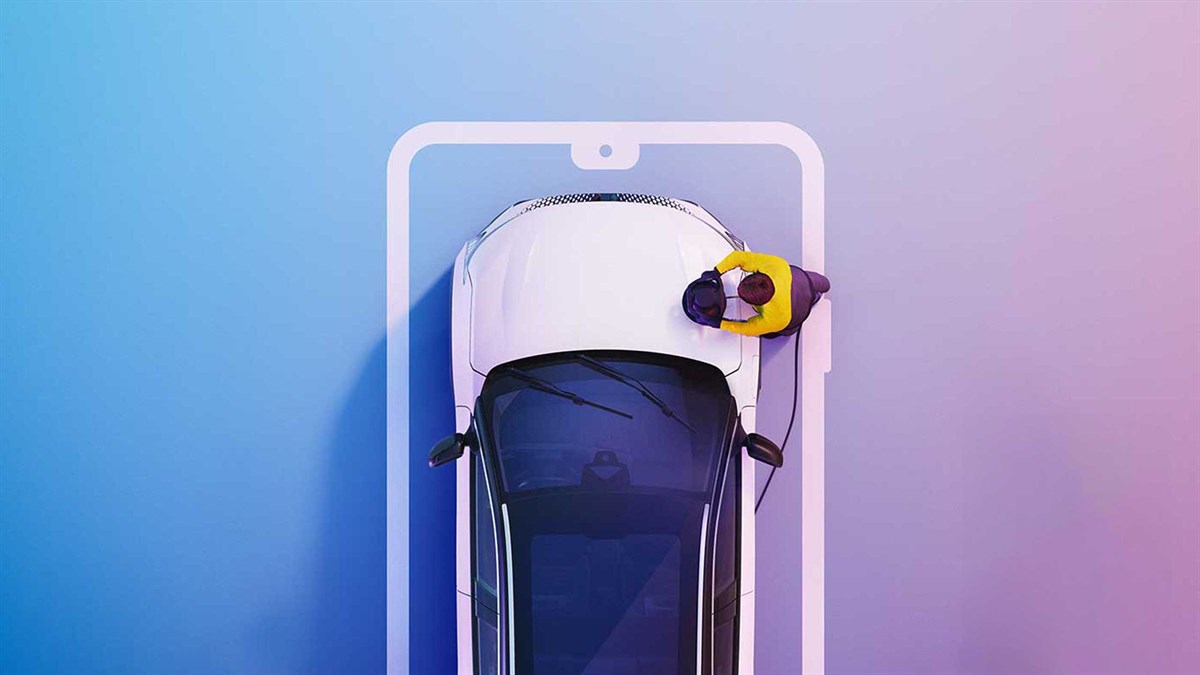 Renault Confidence - A man with a beard smiling, leaning on his car door